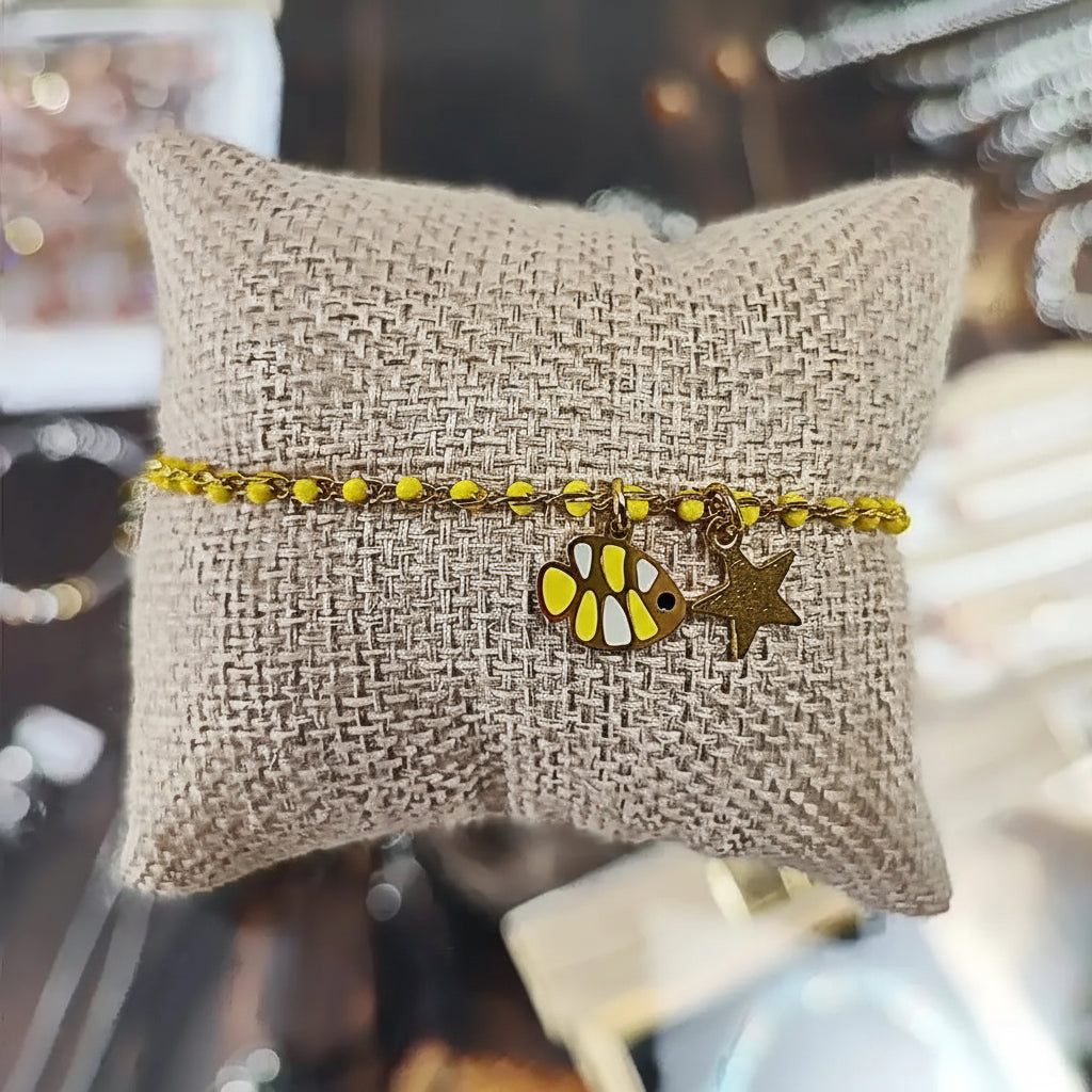 Luce Marina Gialla bracciale Charm che unisce vivacità del sole e mistero del mare