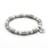 Polignano a Mare: Silberne Wellen in der Eleganz eines Armbandes