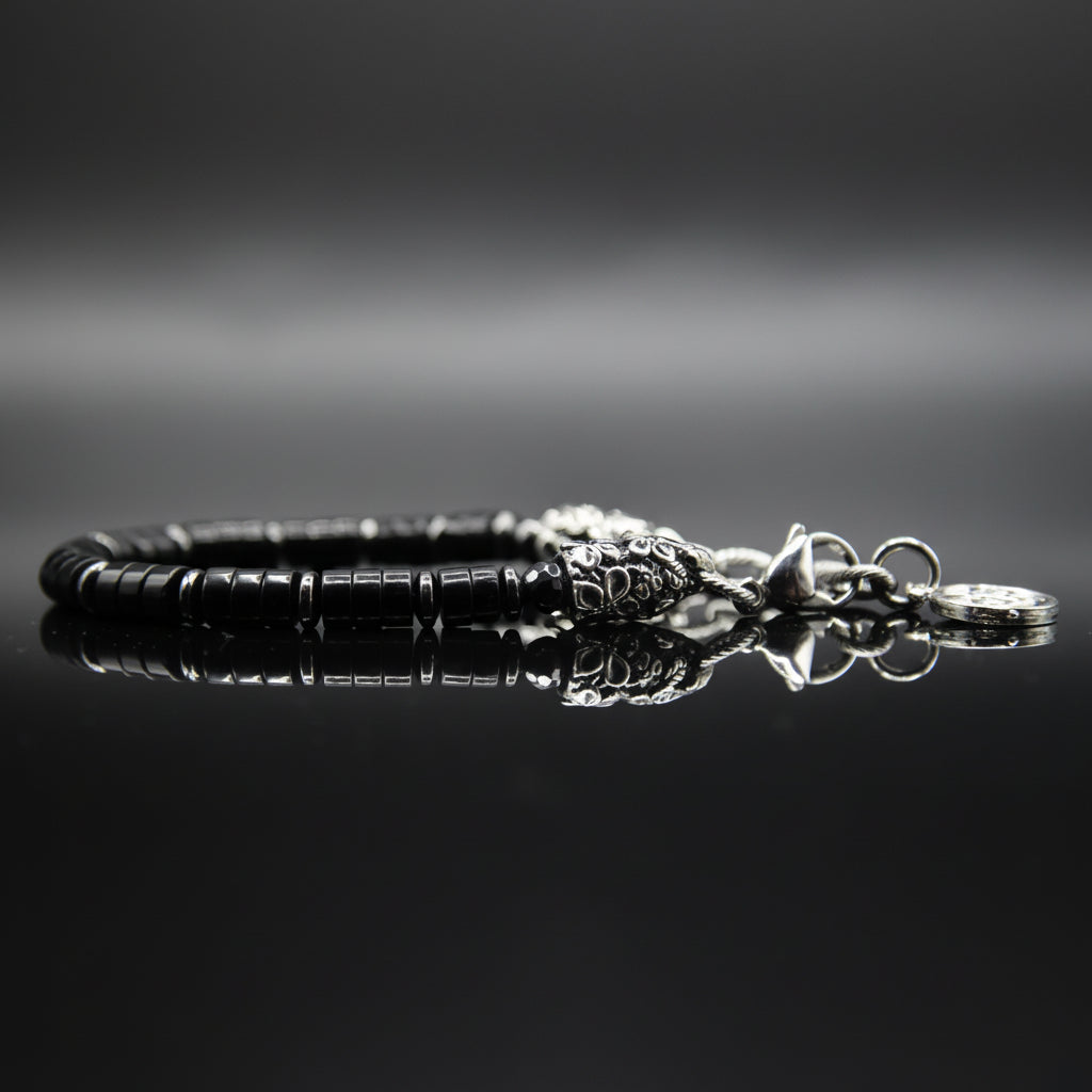 Bracciale Eden Orion: Riflessi Stellari l'Eleganza dell'Onice nera e dell'Ematite