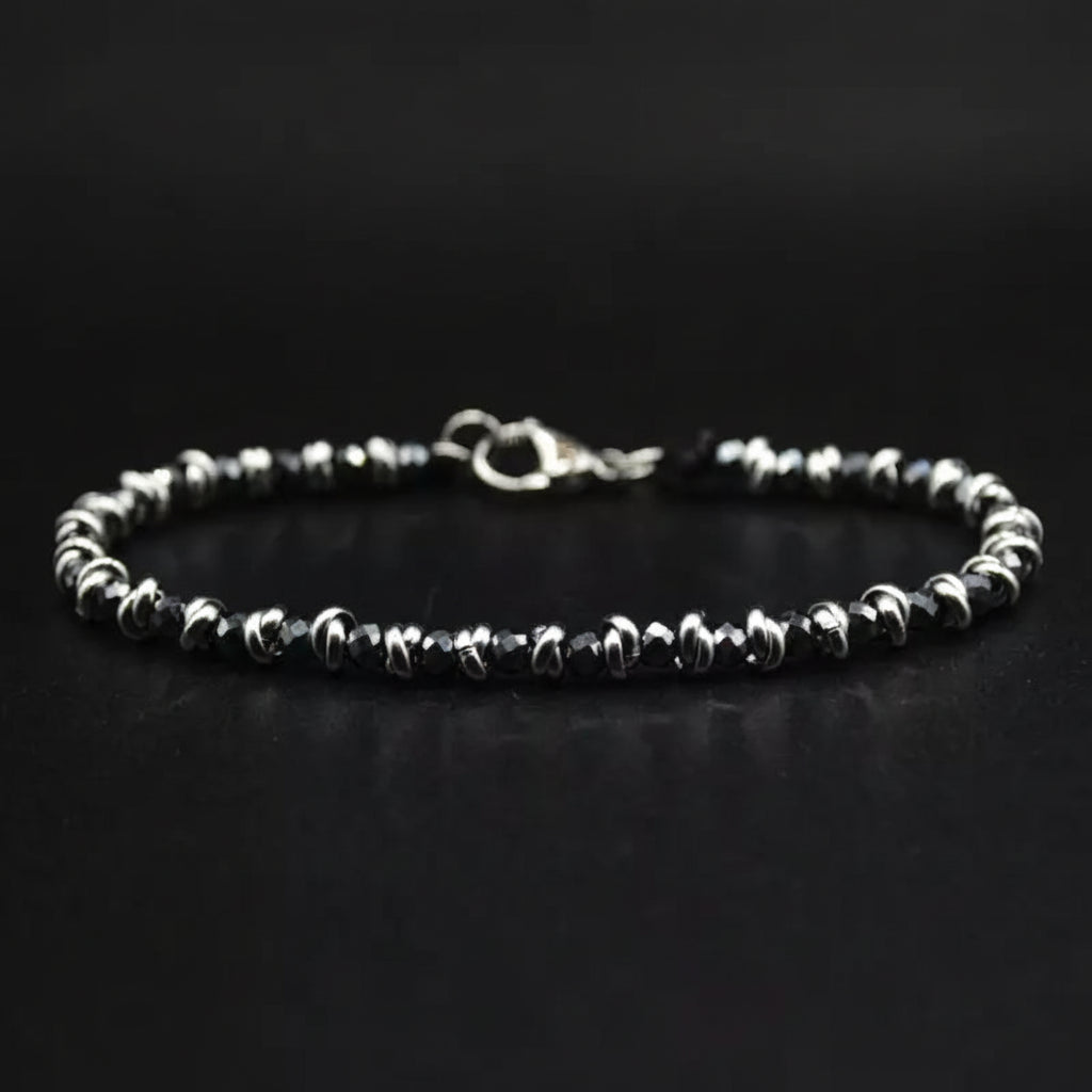 Geflochtenes nautisches Armband aus anthrazitfarbenem Stahl und Hämatit